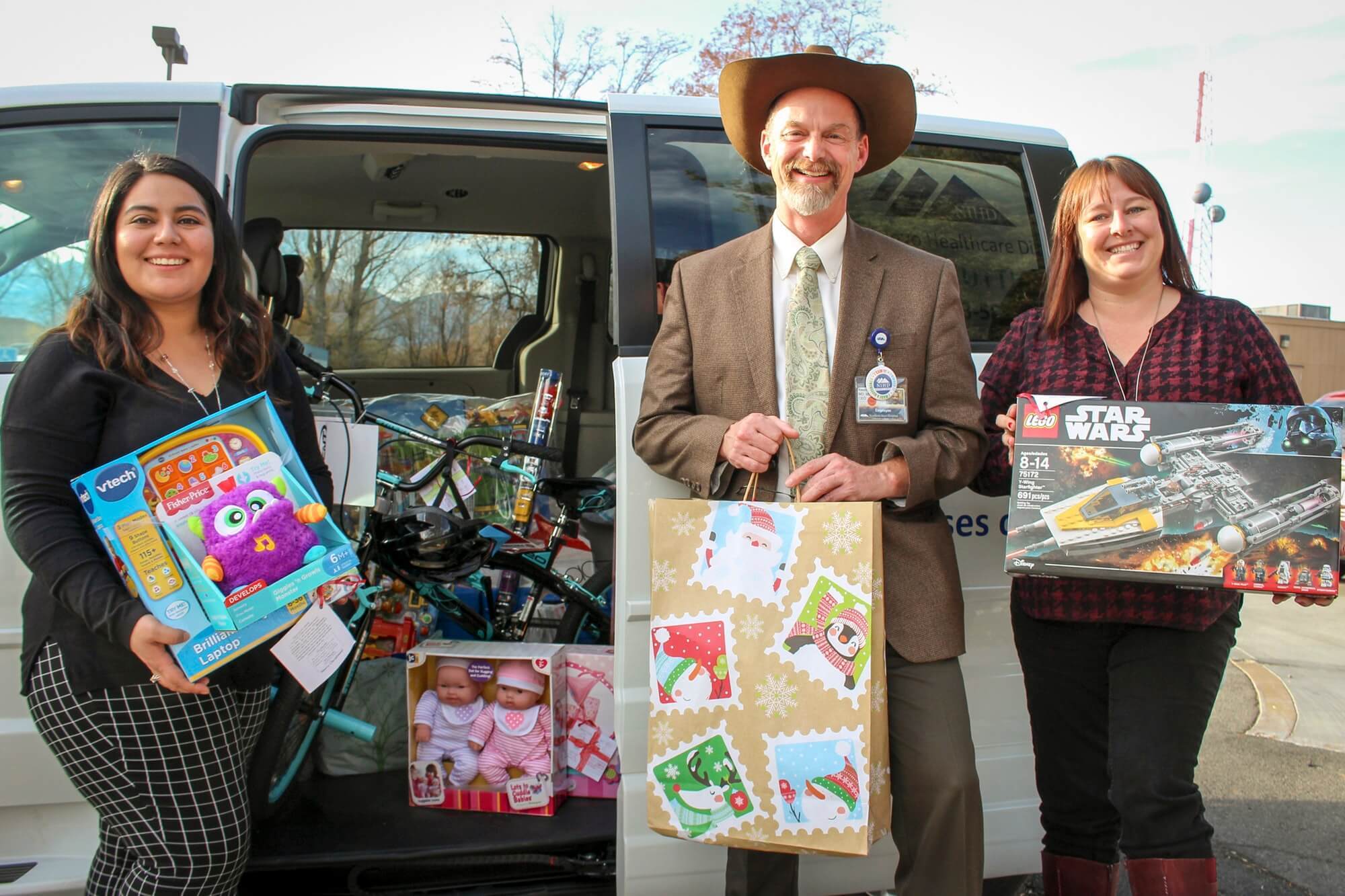 nihd employees holding gifts