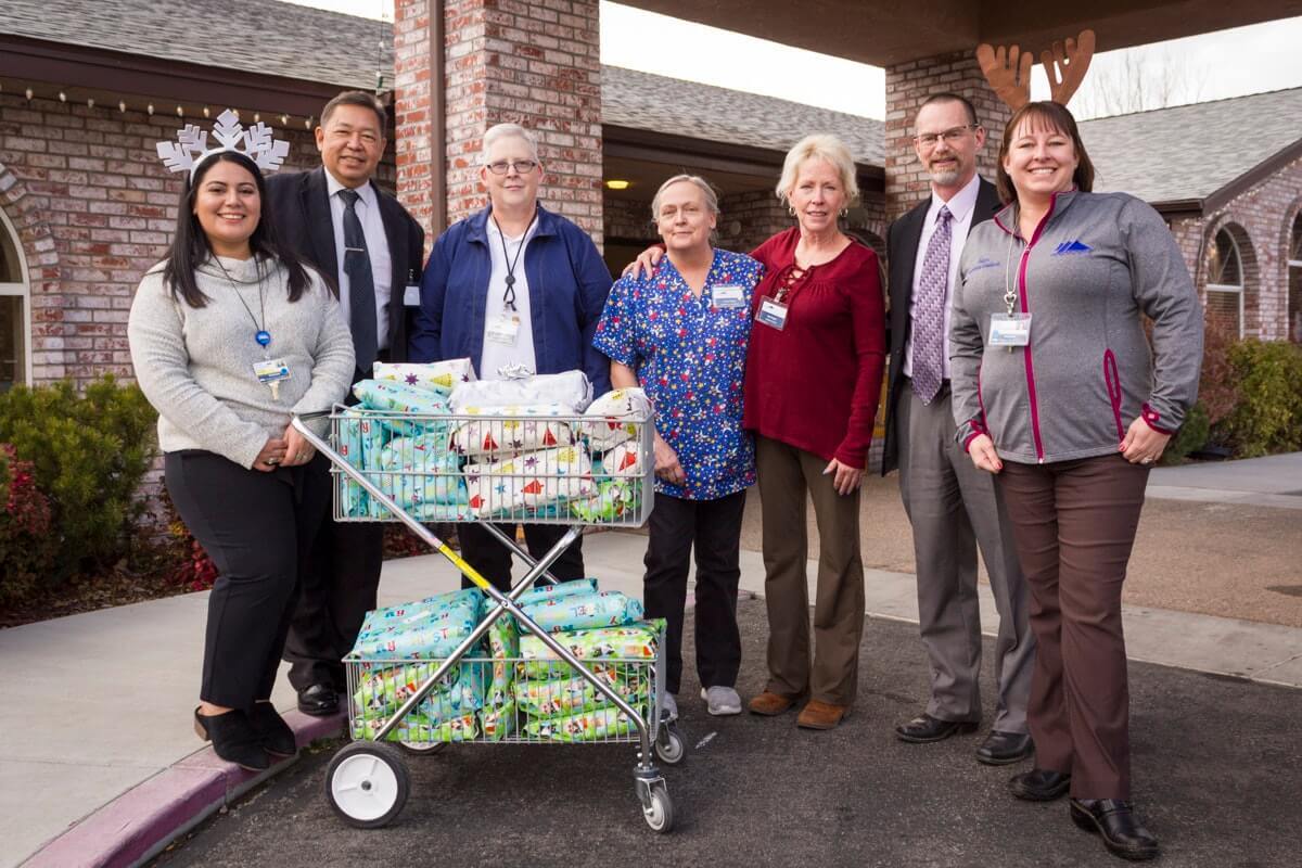 NIHD employees with gifts