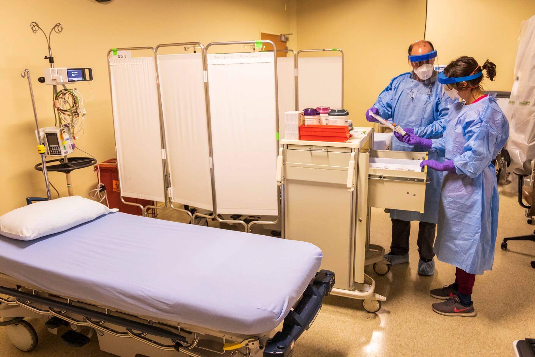 Doctors in patient room